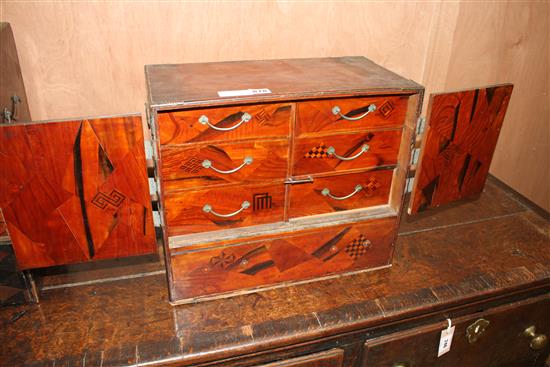 Two Japanese parquetry and lacquer chests, largest W.48cm